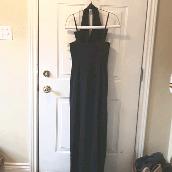 Stunning Plunging Backless Black Halter Gown - Picture 8 of 16